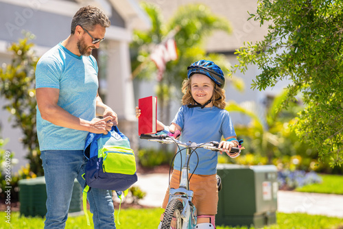 Wallpaper Mural father and son promenade. special bonding moment. father and son in fatherhood. fatherhood of father and son cycling at sunlit park. father and son navigate the winding paths together at fatherhood Torontodigital.ca