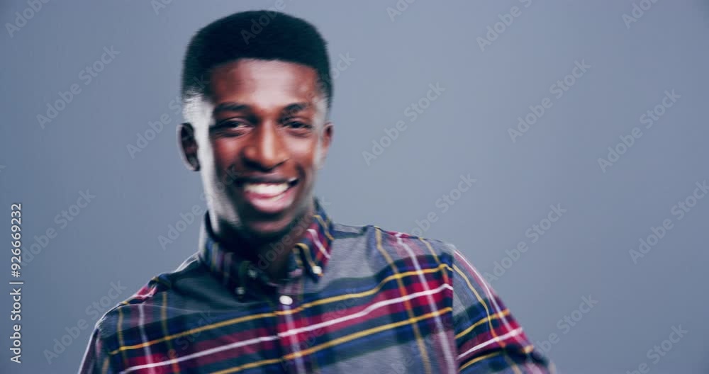 Face, dancing and man with happiness, smile and achievement on a grey studio background. Portrait, person or model with energy, excited or moving with practice, performance or routine with joy or fun Face, dancing and man with happiness, smile and achievement on a grey studio background. Portrait, person or model with energy, excited or moving with practice, performance or routine with joy or fun