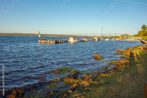 Brasilia, Brazil - Jul 22 2024: pier at lake Paranoa at dusk photo