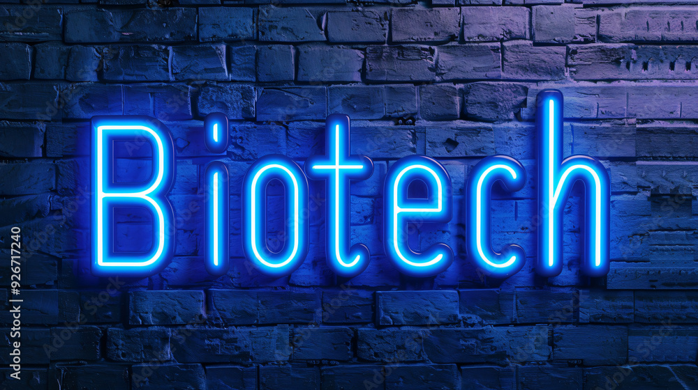 Obraz premium Blue neon sign showing the word biotech mounted on a brick wall, conveying innovation and technology