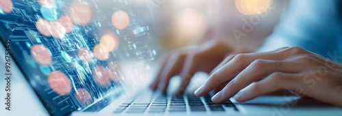 Person typing on a laptop while data visuals appear in a modern workspace