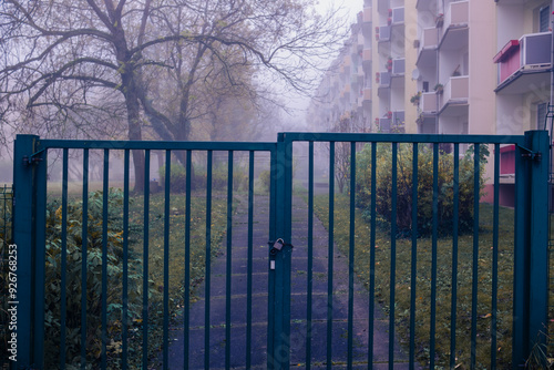 Autumn in a small German town. Houses of a sleeping area in the fog. Autumn time in a quiet German town