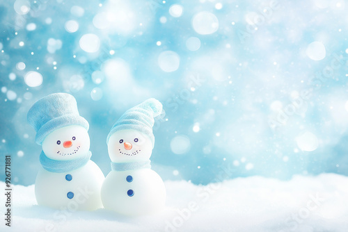 Two small snowmen in cozy hats stand side by side in a soft, snowy landscape. The minimalistic background emphasizes their cute and simple design, evoking feelings of winter cheer and friendship.