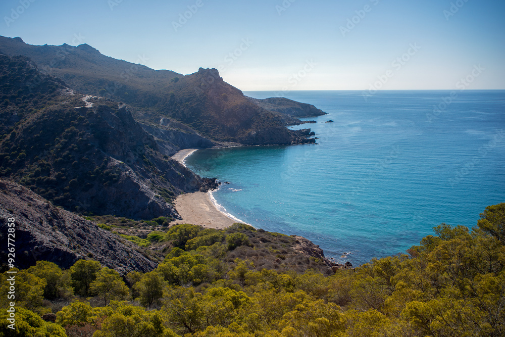 Fototapeta premium View from above of the stunning Fatares beach in Cartagena, Region of Murcia, Spain, in summer