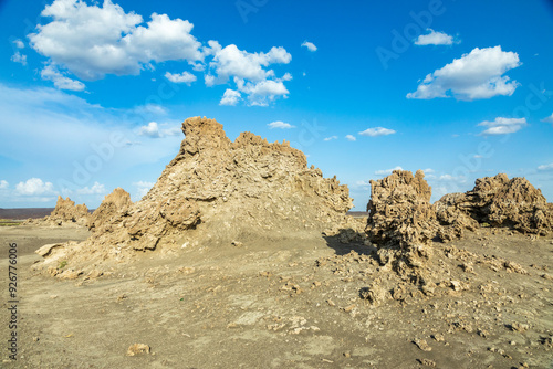 Limestone prehistoric chimneys rock formations, bottom of salt lake Abbe, Dikhil region, Djibouti photo