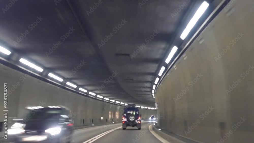 A car drives into the Gotthard Tunnel. Switzerland. TimeLapse