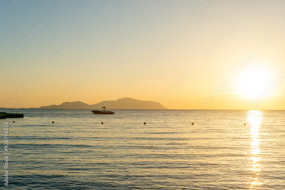 View of Tiran Island during sunset. Egypt, Sharm El Sheikh. Tourism and travel. View of Tiran Island during sunset. Egypt, Sharm El Sheikh. Tourism and travel.