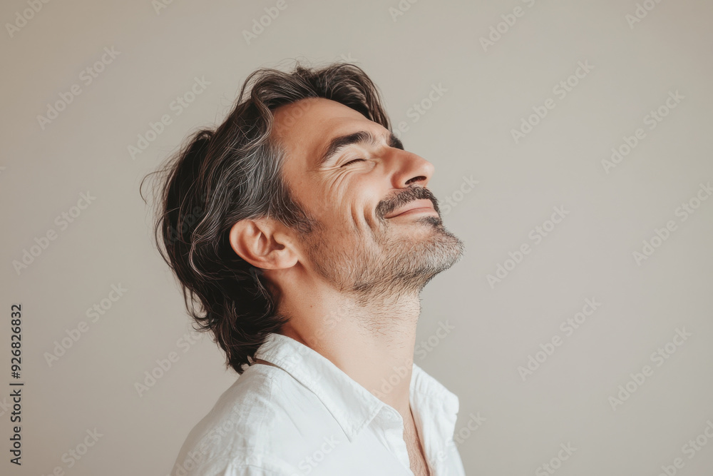 A close up of a man's face with her eyes closed A close up of a man's face with her eyes closed