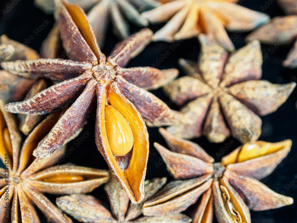 A close-up of anise seeds, highlighting their texture and nuances, is ideal for illustration of spices and cooking A close-up of anise seeds, highlighting their texture and nuances, is ideal for illustration of spices and cooking