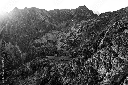 Fototapeta Naklejka Na Ścianę i Meble -  Black and white landscape of the Tatra Mountains. The Orla Perc Mountain Ridge seen from the Mount Koscielec.