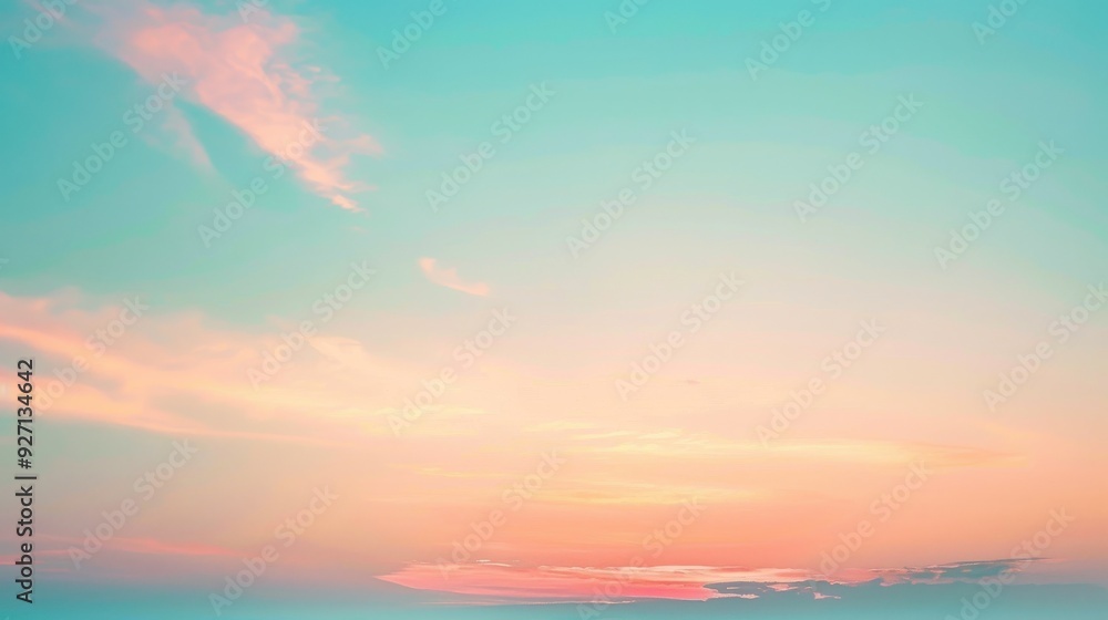 Naklejka premium A soft, pastel pink and blue sunset sky with delicate, wispy clouds stretching across the horizon. The colors are muted and dreamy, creating a sense of peace and tranquility.
