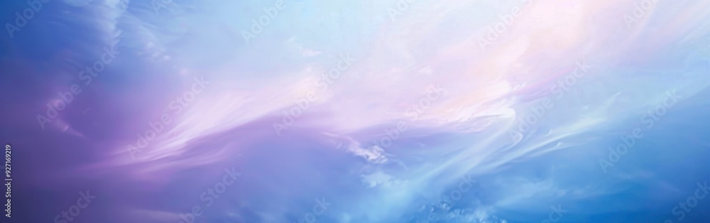 Soft, pastel-colored clouds drift across a daytime sky, with a soft, pale light emanating from the top of the image. The colors are muted, giving the sky a peaceful and serene quality. Soft, pastel-colored clouds drift across a daytime sky, with a soft, pale light emanating from the top of the image. The colors are muted, giving the sky a peaceful and serene quality.