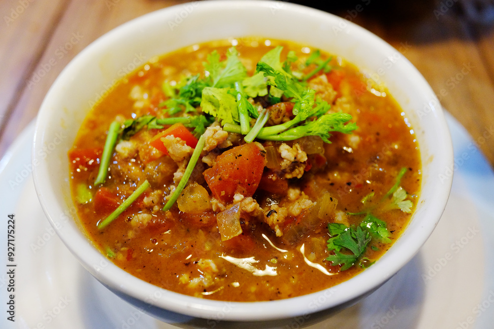 Meat and tomato spicy dip in a bowl is tradition food in Thailand Meat and tomato spicy dip in a bowl is tradition food in Thailand