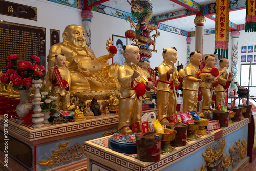 Chachoengsao, Thailand, June 04, 2024, Wat Cheen Pracha Samosorn (Wat Leng Hok Yi), Colorful Chinese Shrine with Golden Statues. photo