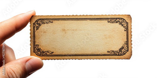 A vintage blank card held between fingers with an ornate border. Perfect for invitations, notes, or creative projects. Transparent background PNG. photo