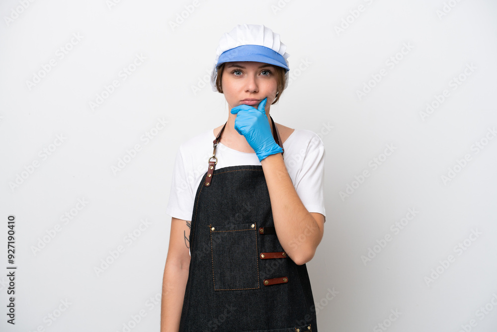 Fishmonger woman wearing an apron thinking Fishmonger woman wearing an apron thinking