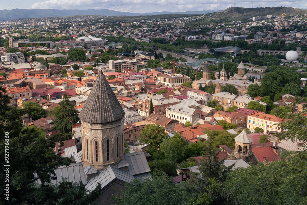 Obraz premium Panoramic cityscape of old town with buildings roofs traditional christian churches, Tbilisi, Georgia