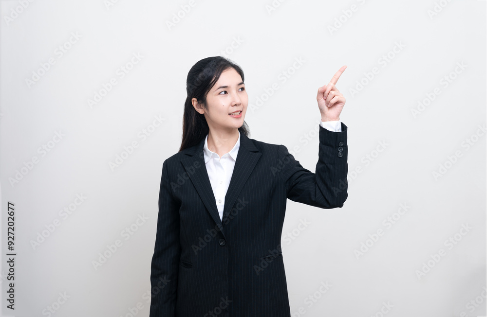Confident Asian business woman smiling and looking at the camera looks professional and executive. successful confident smart independent businesswoman ceo bank manager isolated on white background Confident Asian business woman smiling and looking at the camera looks professional and executive. successful confident smart independent businesswoman ceo bank manager isolated on white background