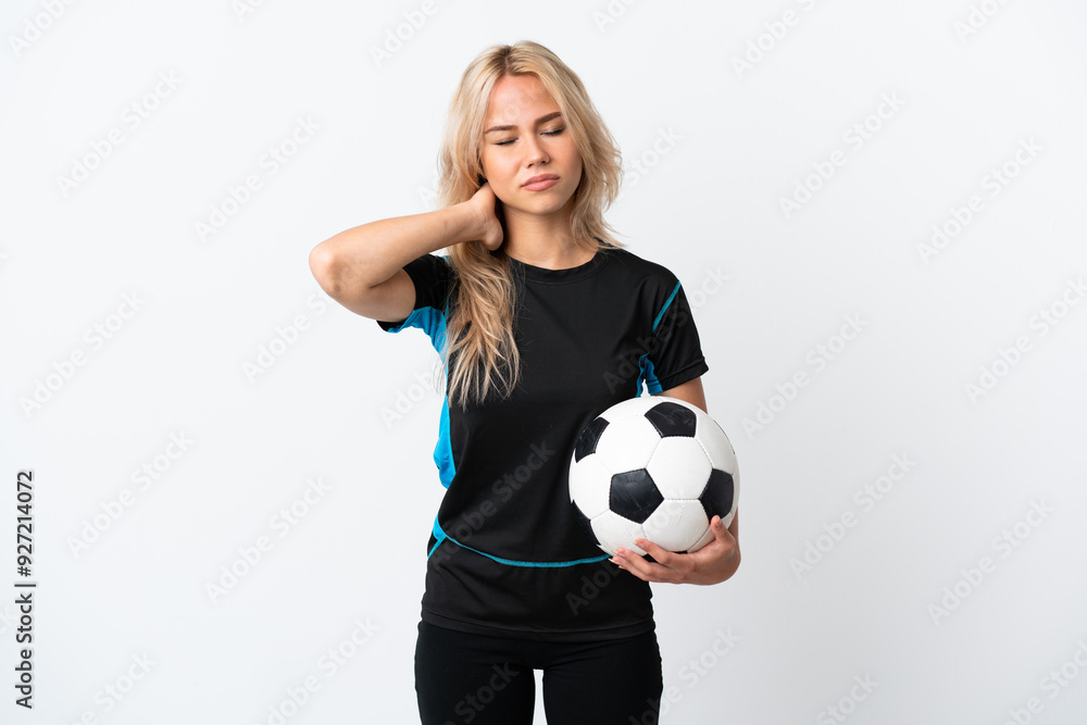 Young Russian woman playing football isolated on white background with neckache Young Russian woman playing football isolated on white background with neckache