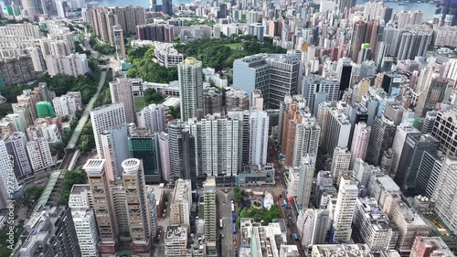 Hong Kong Kowloon Mong Kok railway station construction redevelopment near Sai Yee Street Argyle Street,building a towering green commercial skyscraper, showcasing urban innovation and architectural photo