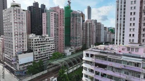 Hong Kong Kowloon Mong Kok railway station construction redevelopment near Sai Yee Street Argyle Street,building a towering green commercial skyscraper, showcasing urban innovation and architectural photo