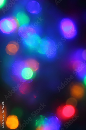 different blurred multicolor light spots. new year holiday background
