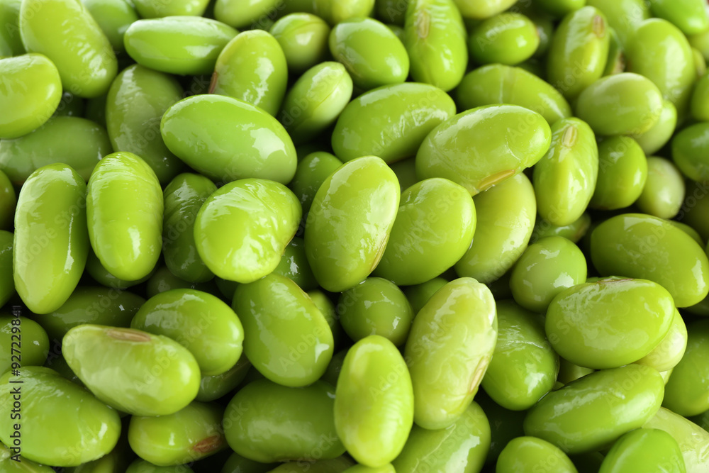 Raw green edamame soybeans as background, closeup Raw green edamame soybeans as background, closeup