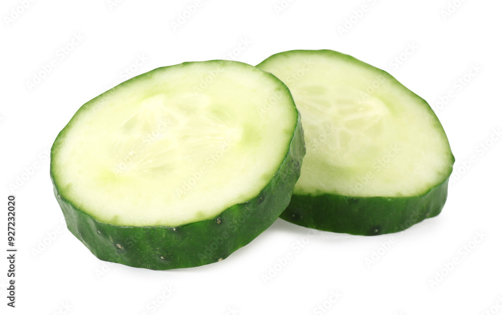 Slices of fresh cucumber isolated on white Slices of fresh cucumber isolated on white