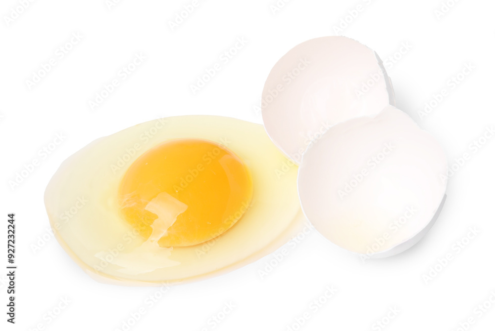 Broken raw egg and shell isolated on white Broken raw egg and shell isolated on white