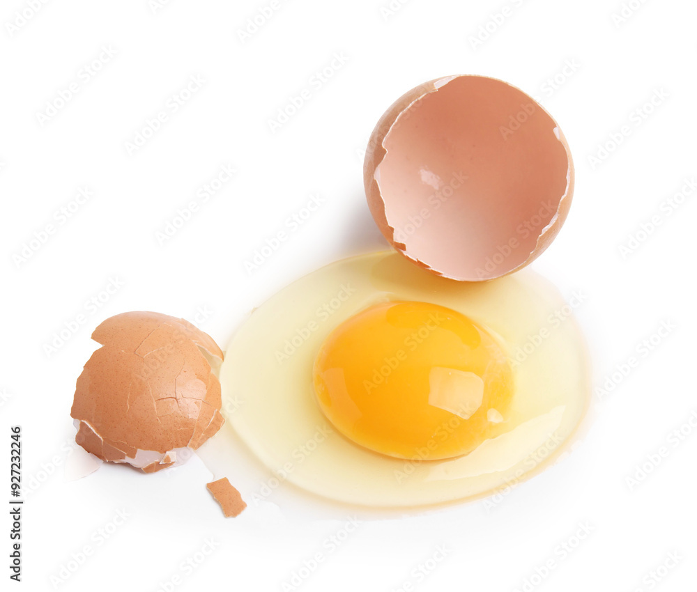 Broken raw egg and shell isolated on white