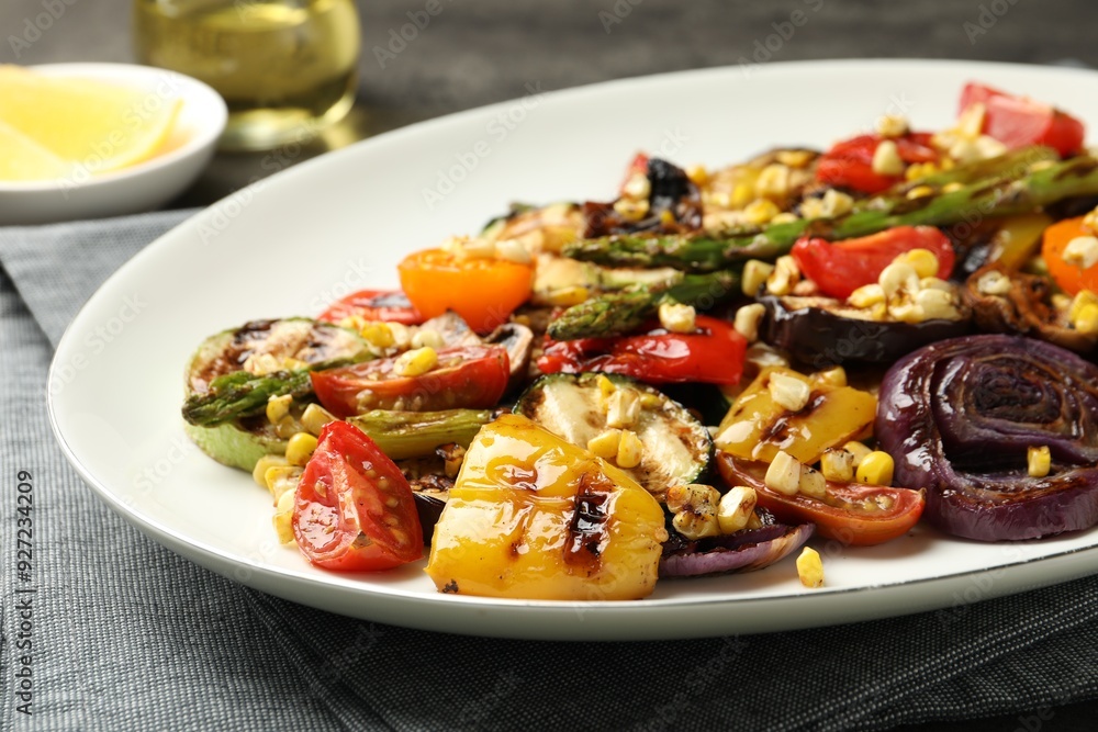 Delicious salad with grilled vegetables on table, closeup view Delicious salad with grilled vegetables on table, closeup view