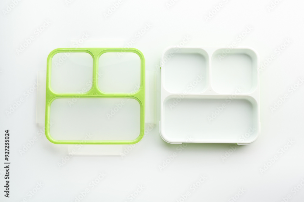 Plastic lunch box and lid isolated on white, top view Plastic lunch box and lid isolated on white, top view