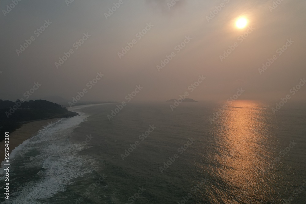 Fototapeta premium Somke sunrise at Brazil due rainforest fires. 