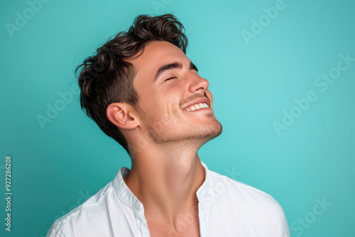 A close up of a man's face with her eyes closed