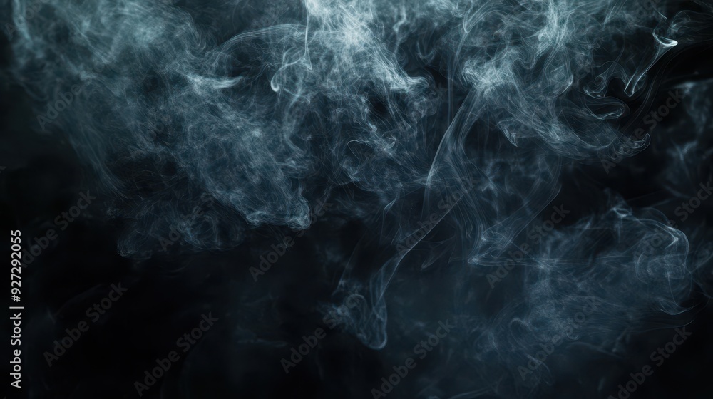 A swirling pattern of smoke against a dark background, creating a mysterious atmosphere. A swirling pattern of smoke against a dark background, creating a mysterious atmosphere.