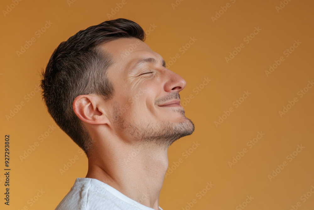 Obraz premium A close up of a man's face with her eyes closed