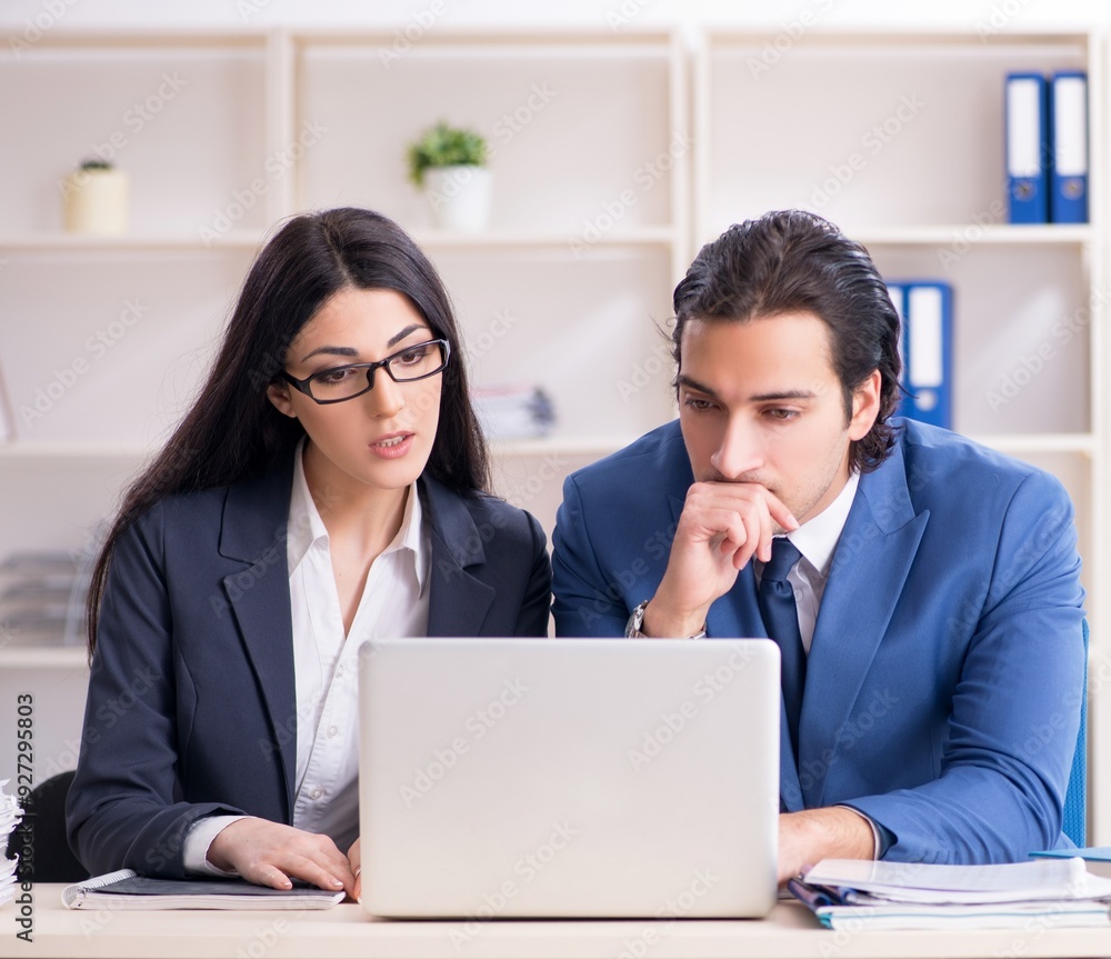 Fototapeta premium Two employees working in the office