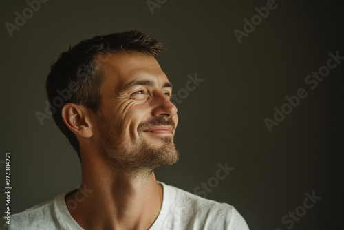 A close up of a man's face with her eyes closed