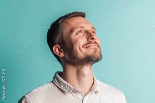 A close up of a man's face with her eyes closed