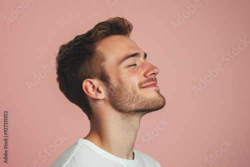 A close up of a man's face with her eyes closed