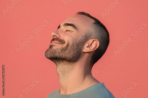 A close up of a man's face with her eyes closed