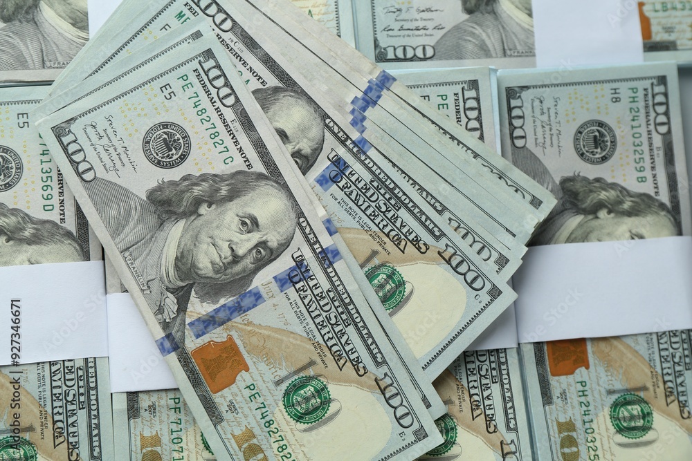 Fototapeta premium Many dollar banknotes as background, top view