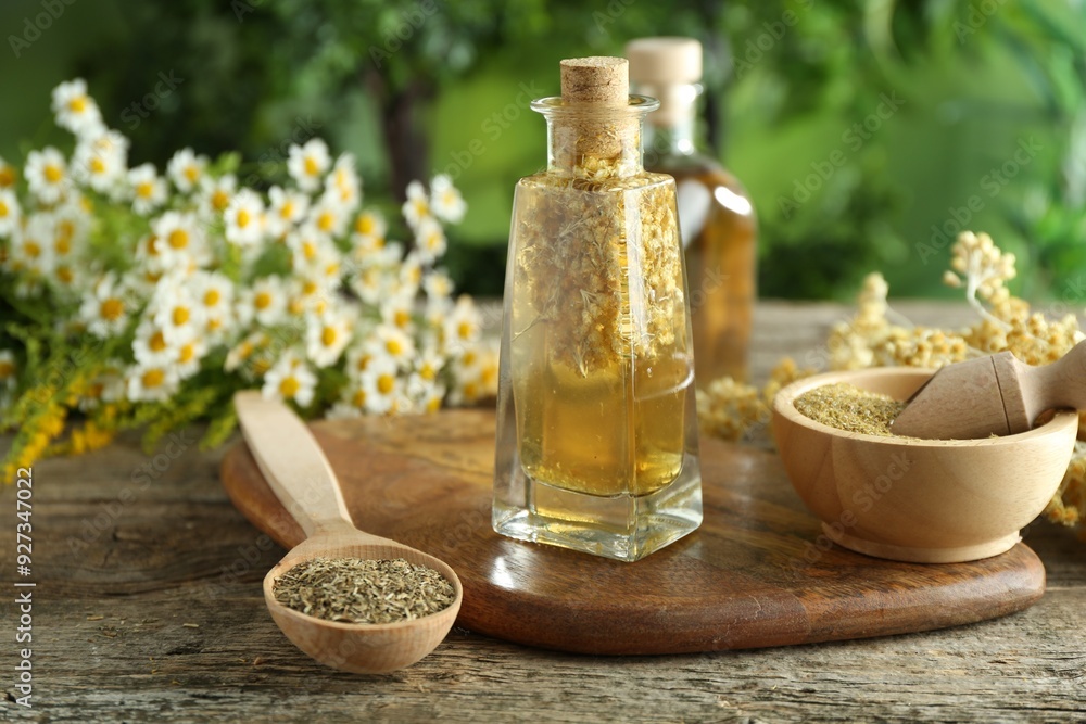 Different ingredients for tincture on wooden table Different ingredients for tincture on wooden table