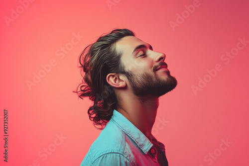 A close up of a man's face with her eyes closed