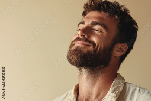 A close up of a man's face with her eyes closed