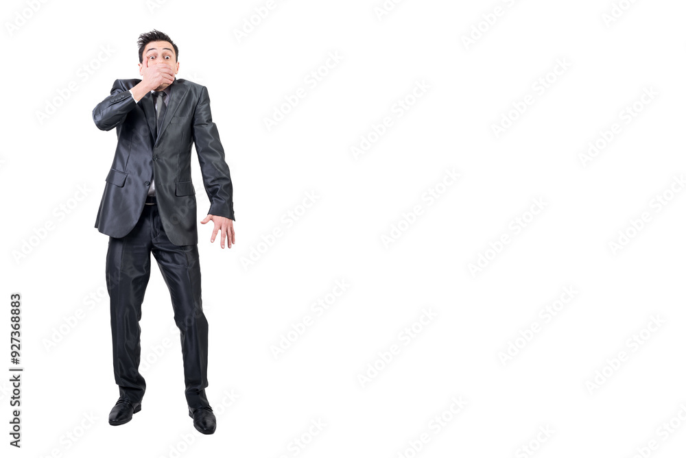 Man covering mouth in studio. White background. Man covering mouth in studio. White background.