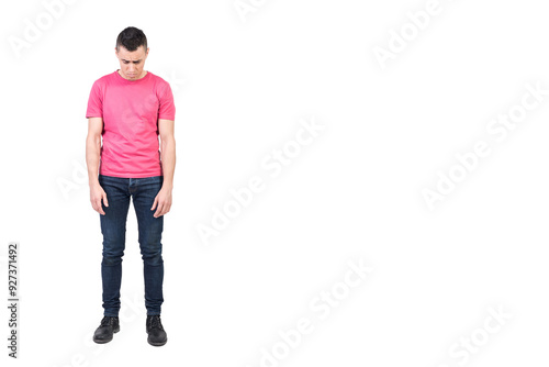 Displeased man in light studio. White background