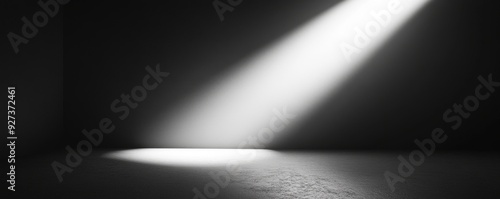 Black and white gradient background with a spotlight