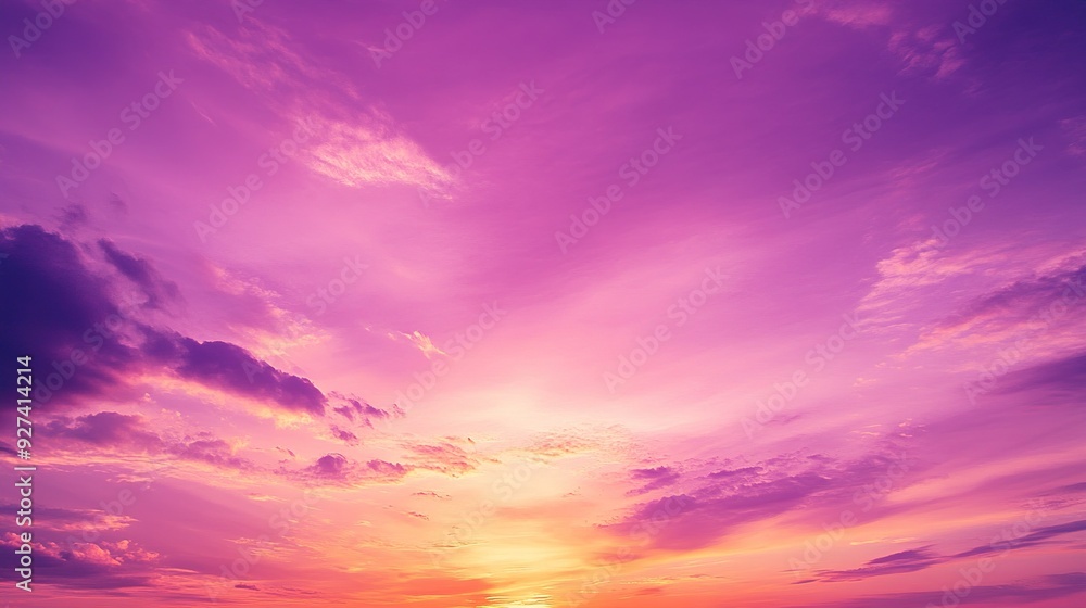 Fototapeta premium Sunset over calm ocean with vibrant purple and orange sky at dusk