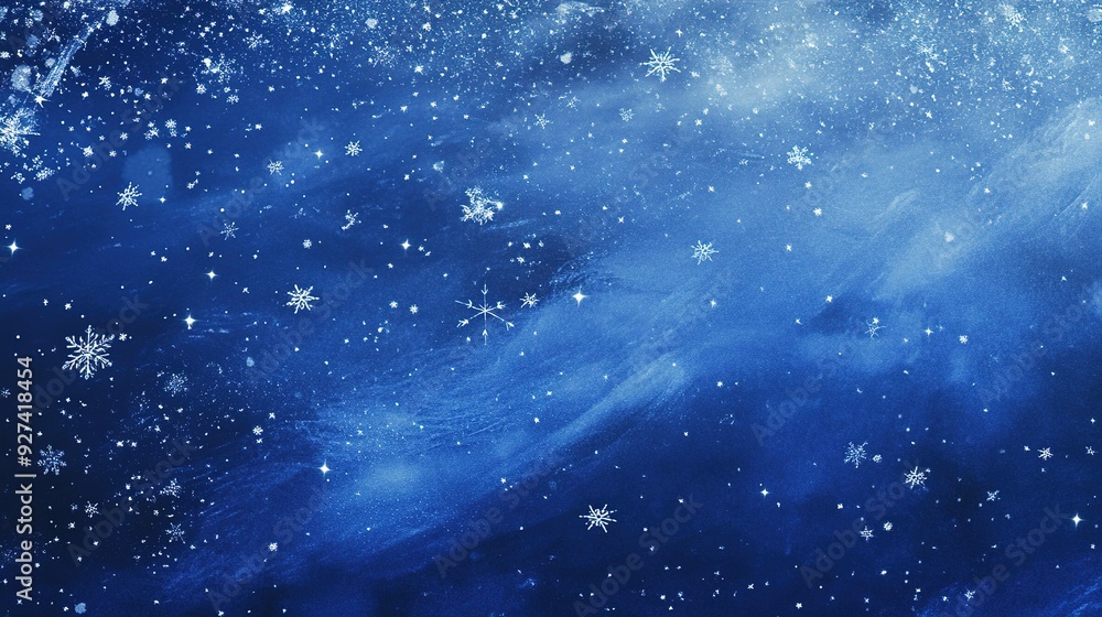 A starry night sky filled with snowflakes in a deep blue hue during winter A starry night sky filled with snowflakes in a deep blue hue during winter